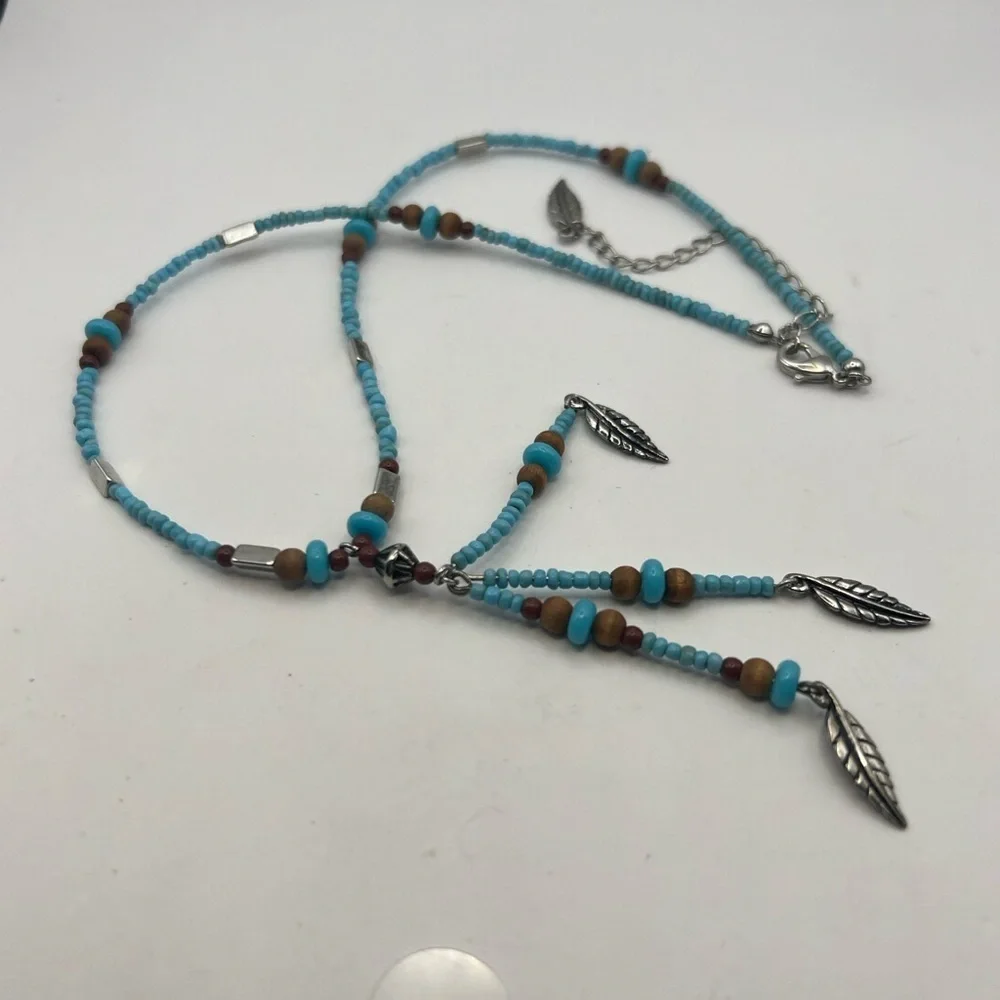 Avon Turquoise color seed pearls feather drop necklace